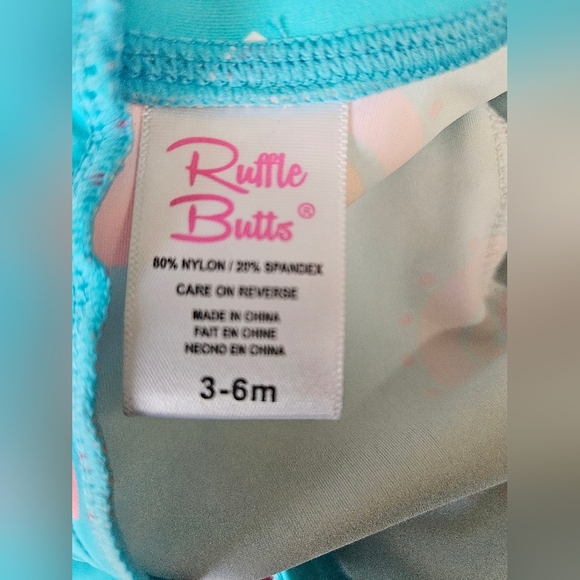 Ruffle Butts-baby Girl swimsuit SZ 3-6 UPF50+ Long Sleeve One Piece Rash Guard - - Picture 9 of 9